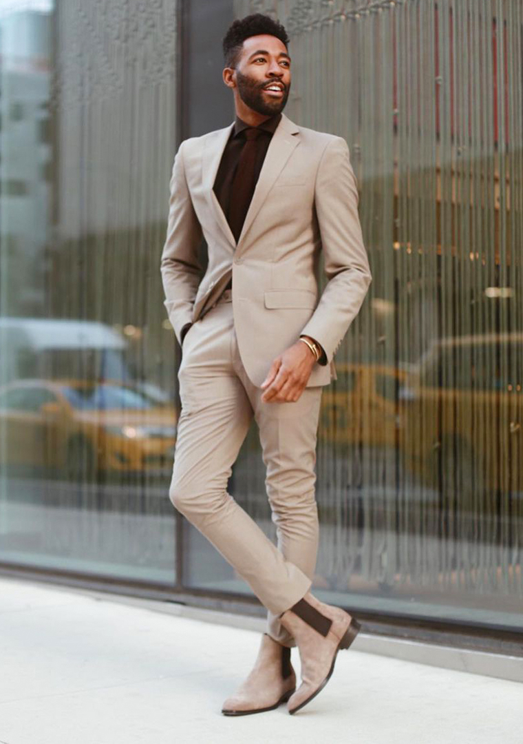 Beige suit, brown dress shirt, and beige Chelsea boots