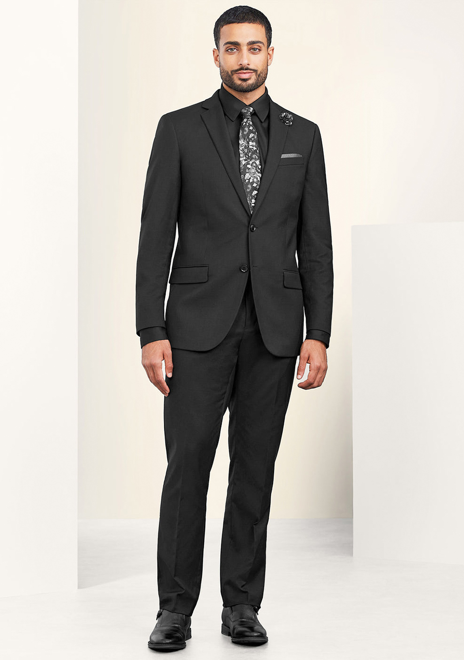 Black dress shirt store with black suit