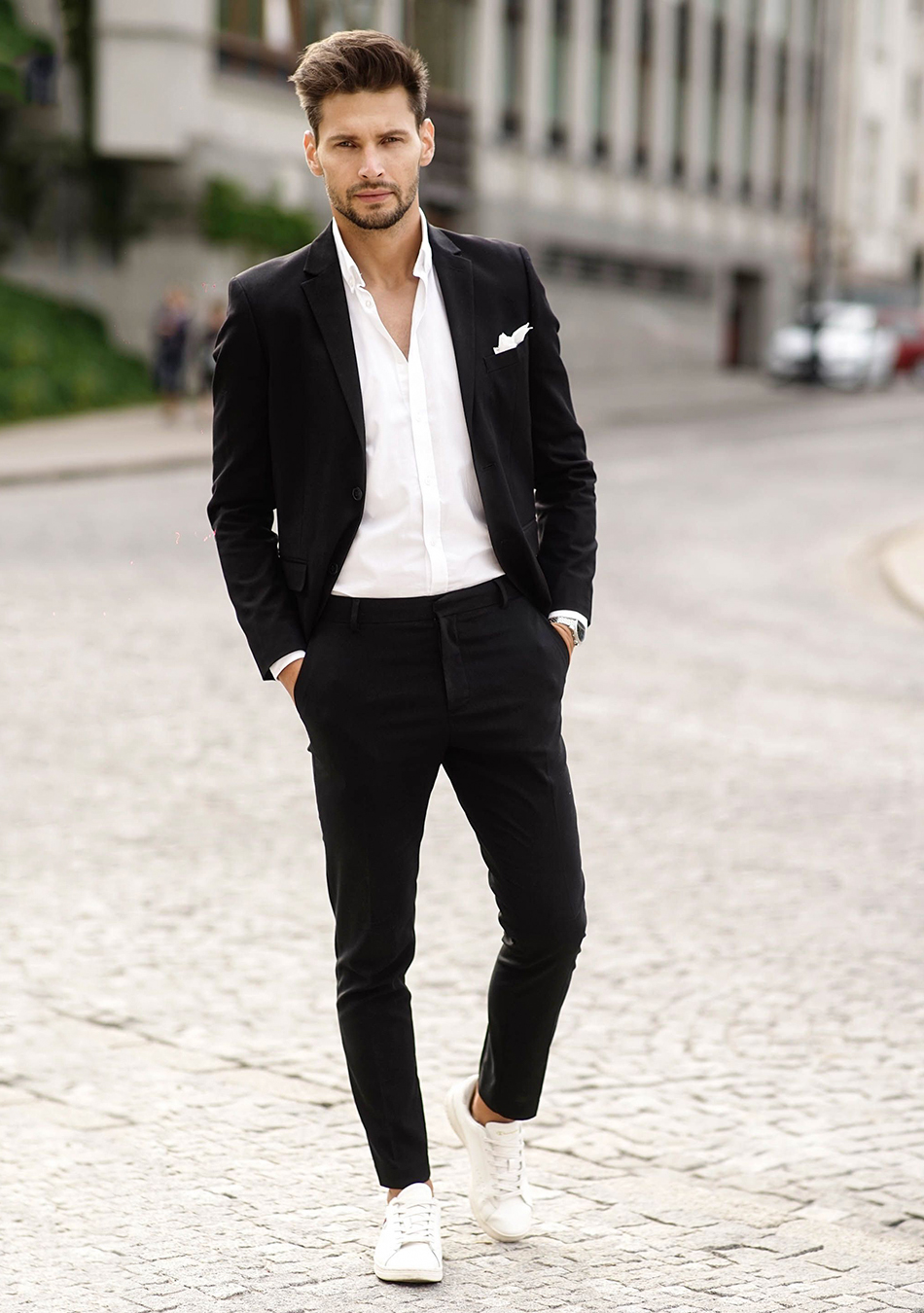 Black suit, white dress shirt, and white sneakers