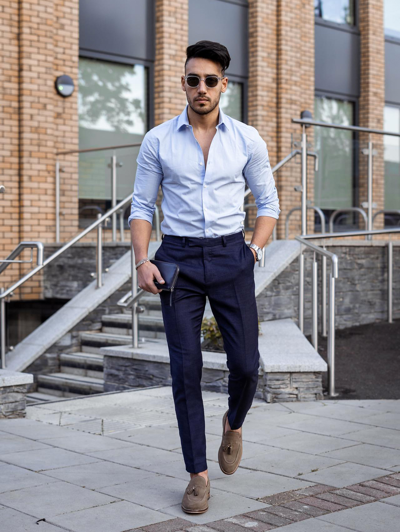 Blue shirt, navy dress pants, and tan tassel loafers