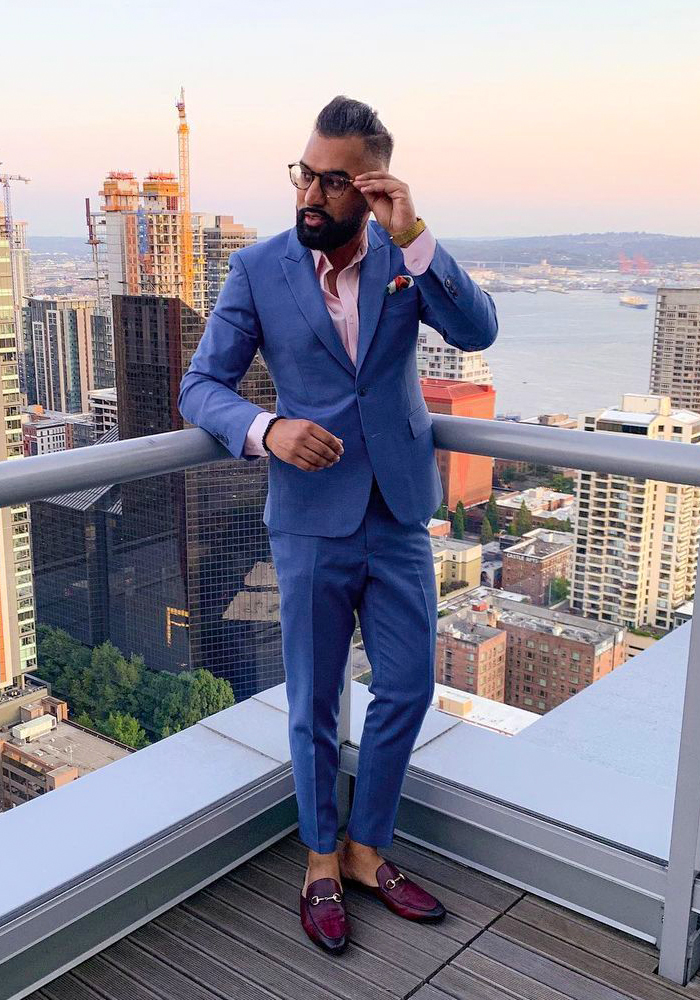 Blue suit with a pink dress shirt and burgundy Gucci loafers