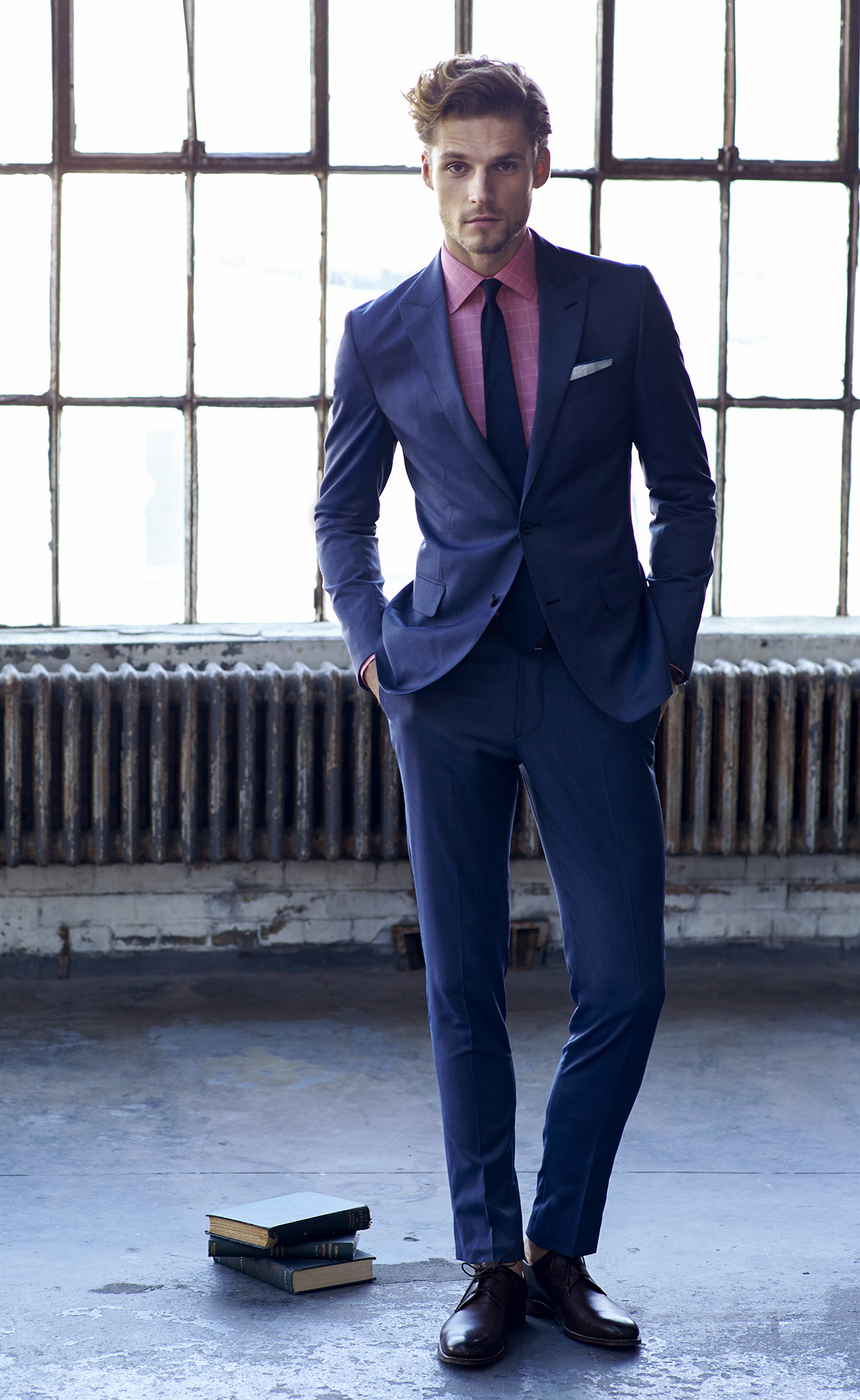 Blue suit, pink shirt, and navy tie