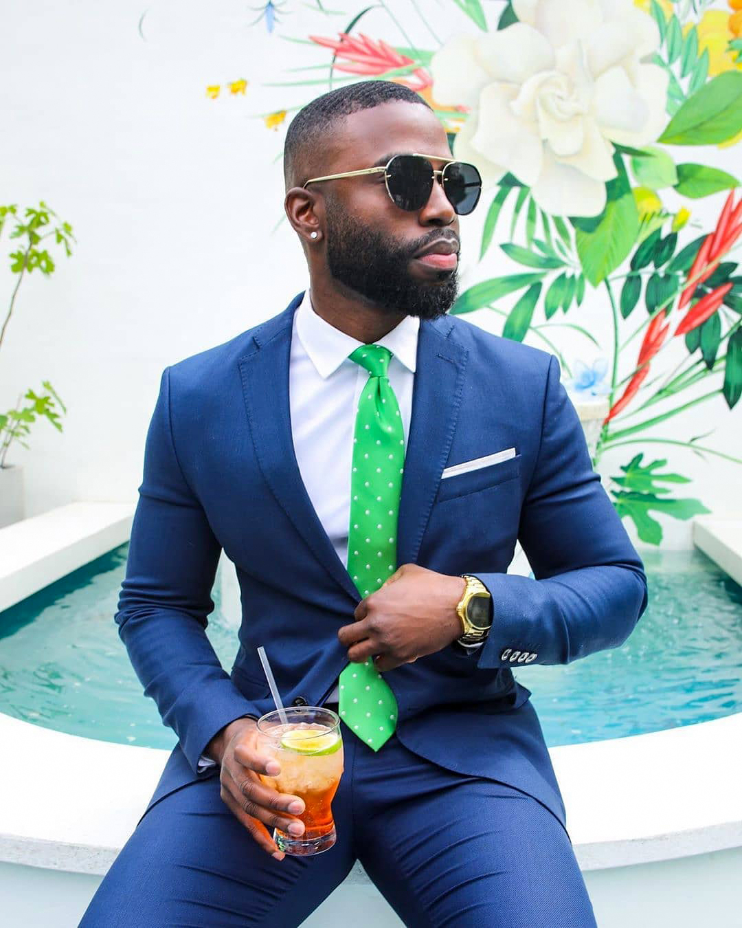 Blue suit, white shirt, and light green tie