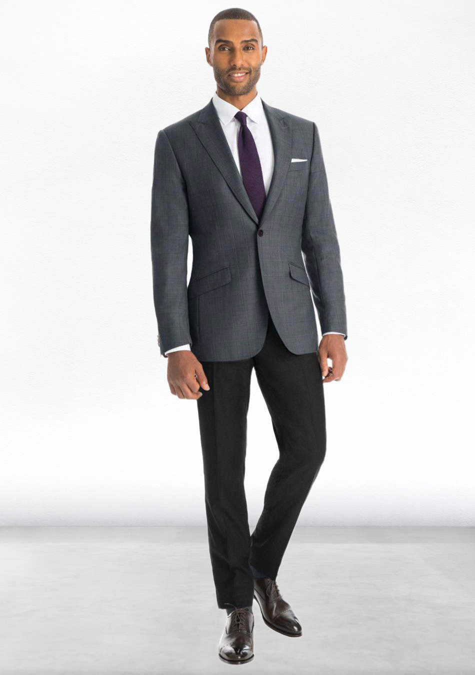 Charcoal grey blazer, white dress shirt, violet tie, black dress pants, and dark brown Oxford shoes