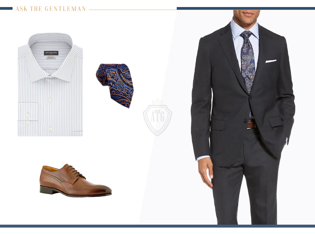 Semi-formal outfit: charcoal suit with a patterned dress shirt and brown shoes