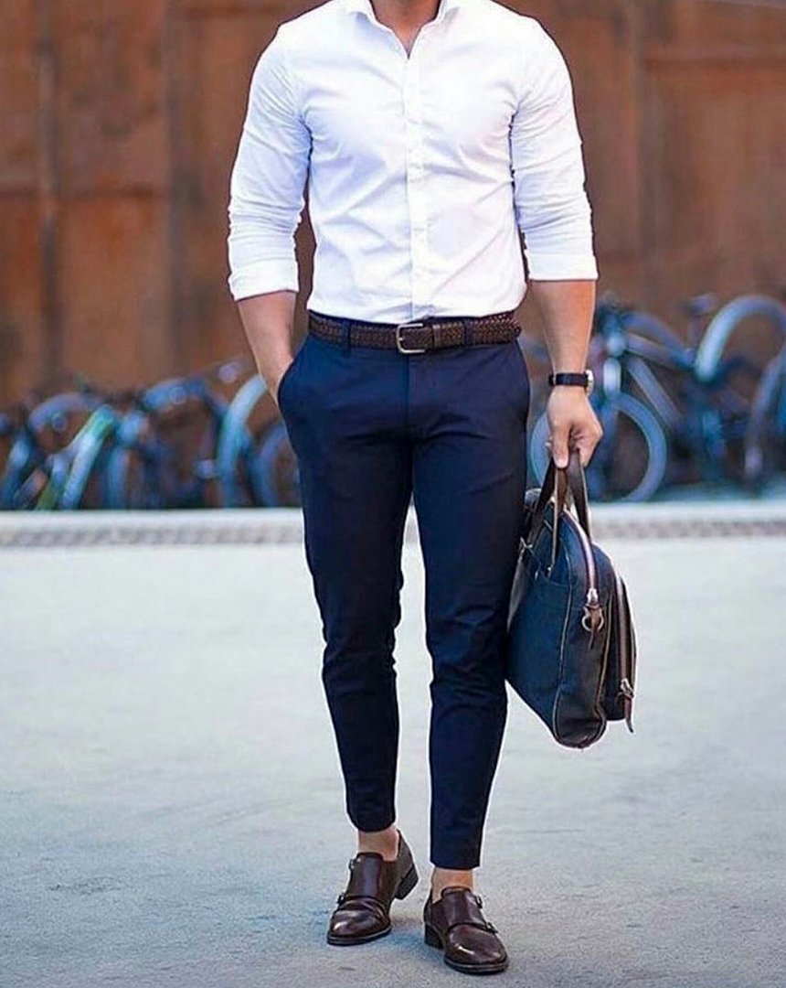 Standard business casual outfit: dark blue pants, white shirt, and dark brown monk straps