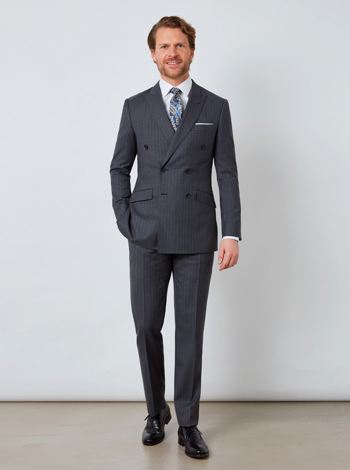 Charcoal suit, white shirt, black Oxford shoes, and blue paisley tie