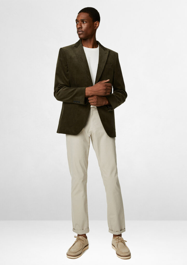 Green blazer and off-white beige jeans