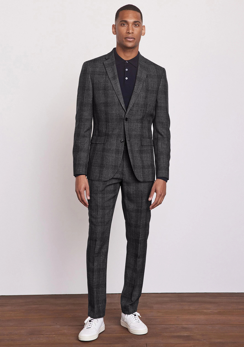 Grey check suit store with black shirt