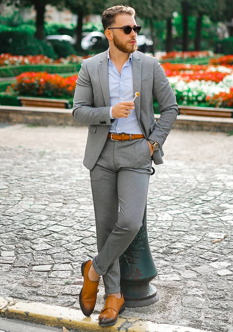 Grey suit, light blue dress shirt, and brown double monks