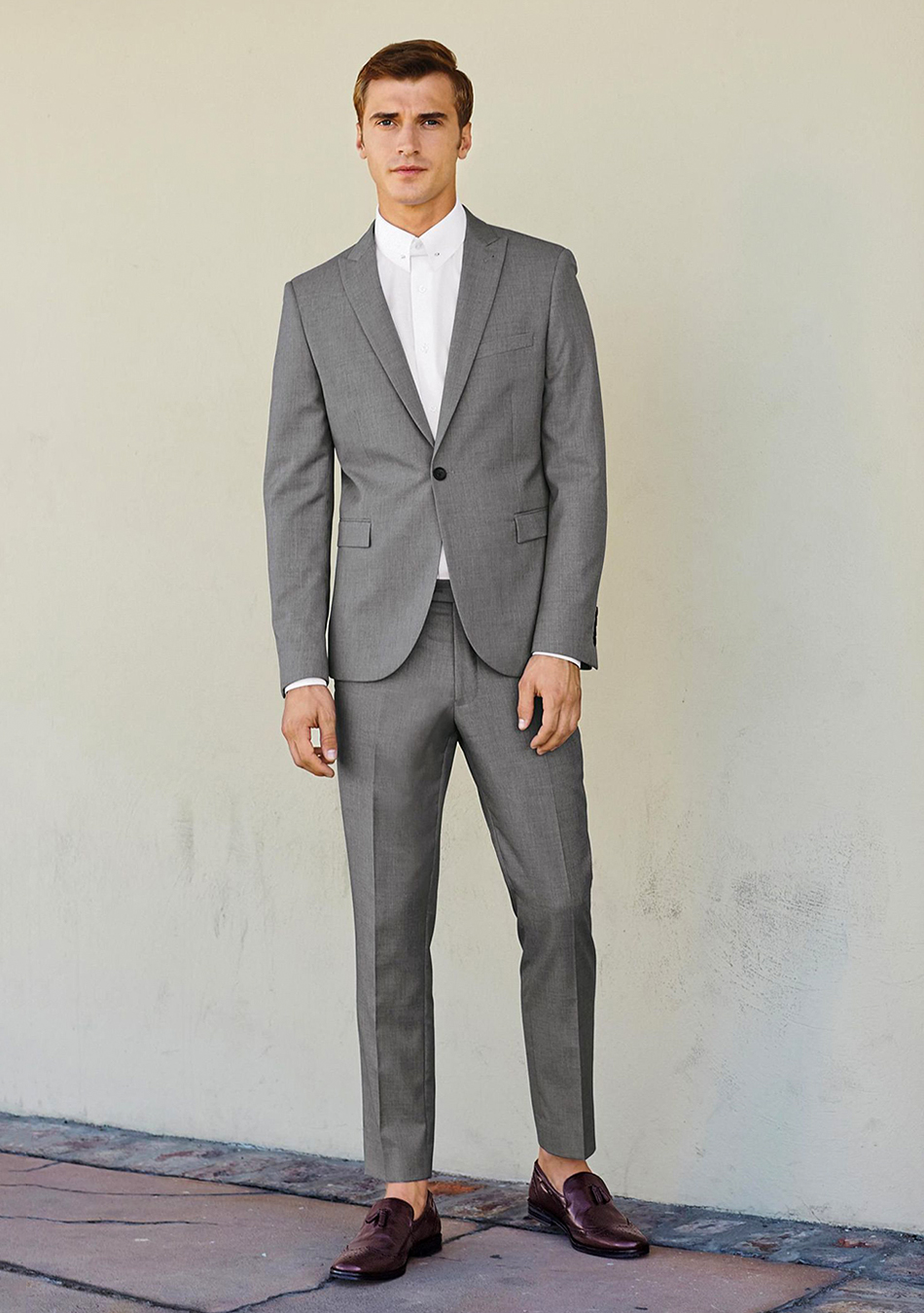 Grey suit, white dress shirt, and oxblood loafers