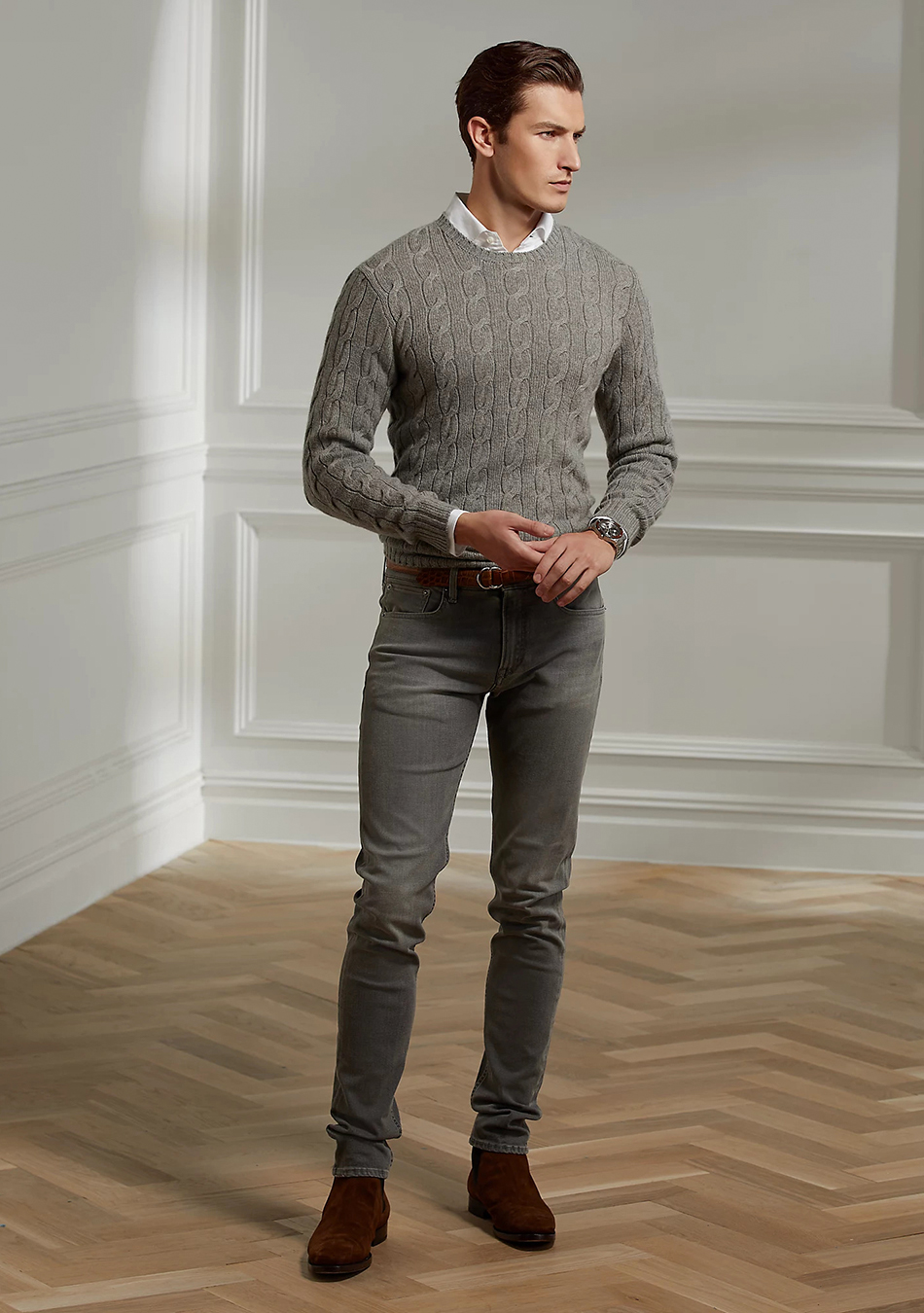Grey sweater, white shirt, grey jeans, and brown Chelsea boots