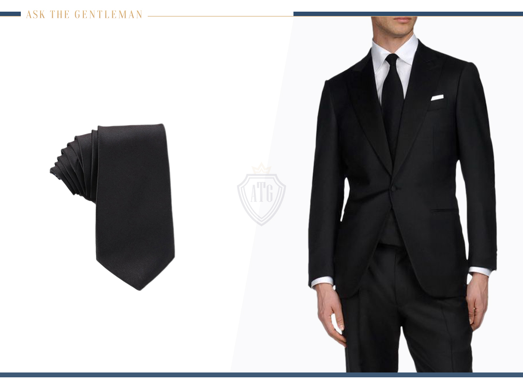 How to wear a black suit with a black tie