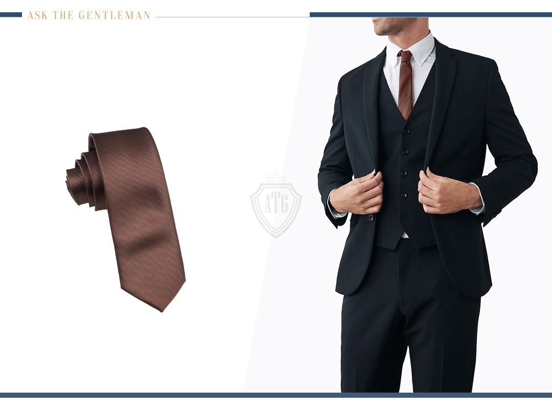 How to wear a black suit with a brown tie