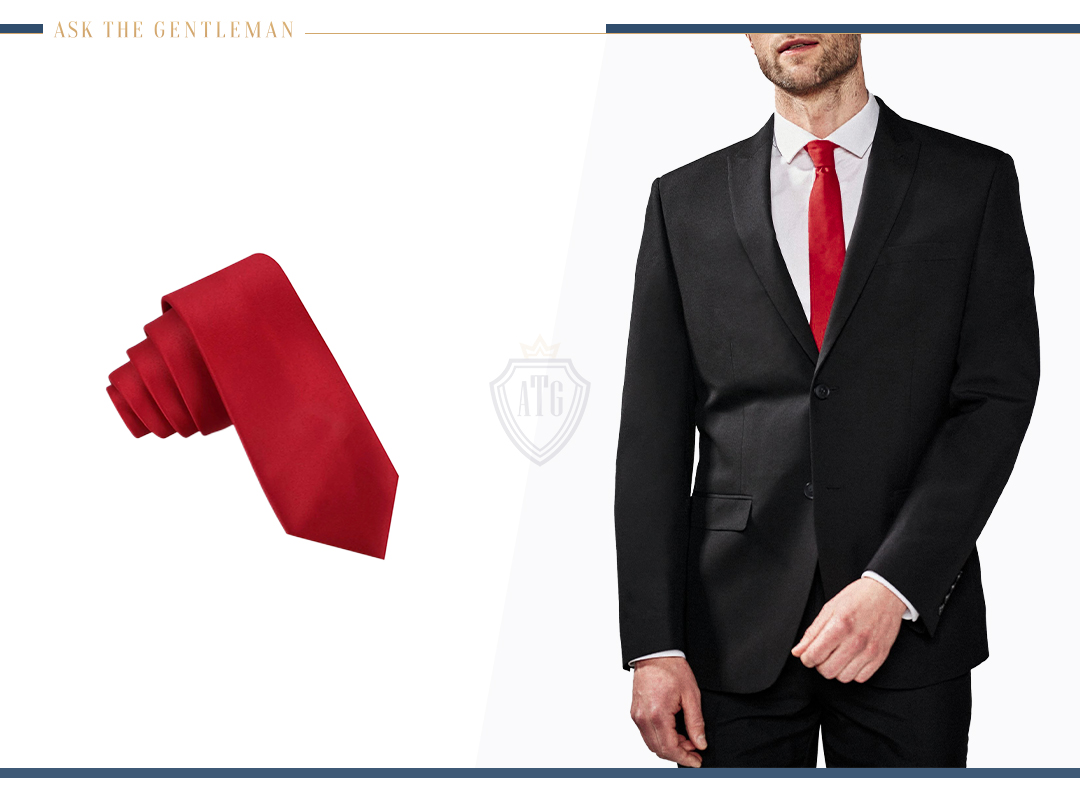 How to wear a black suit with a red tie
