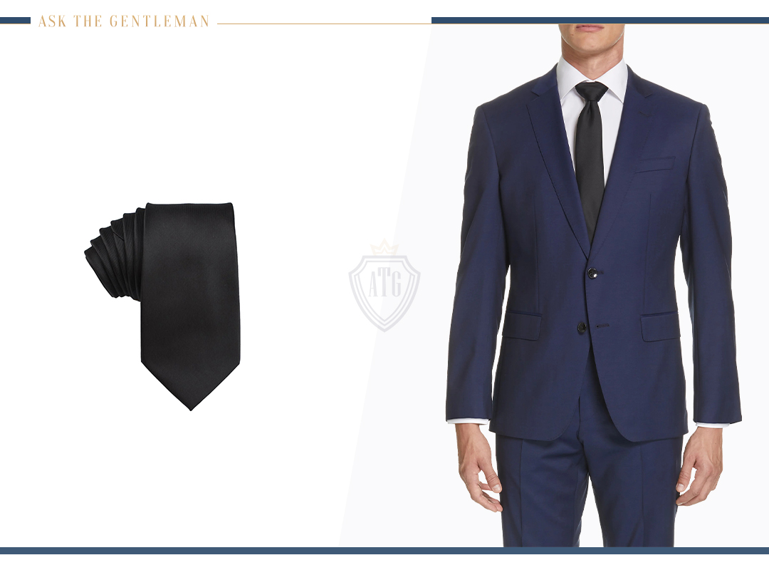 How to wear a blue suit with a black tie
