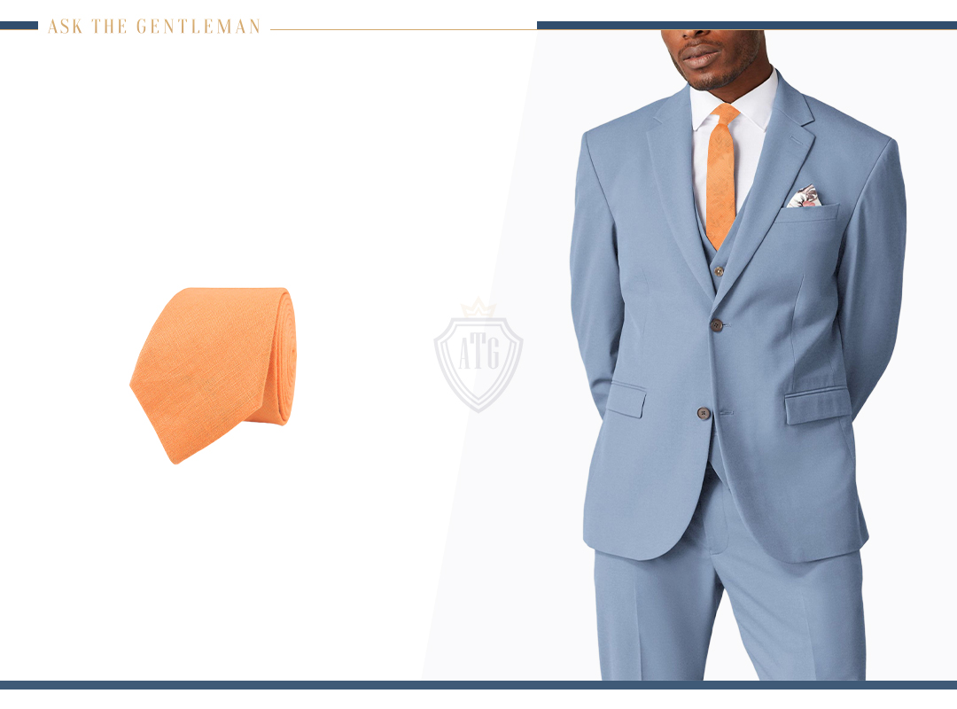 How to wear a three-piece blue suit with an orange tie