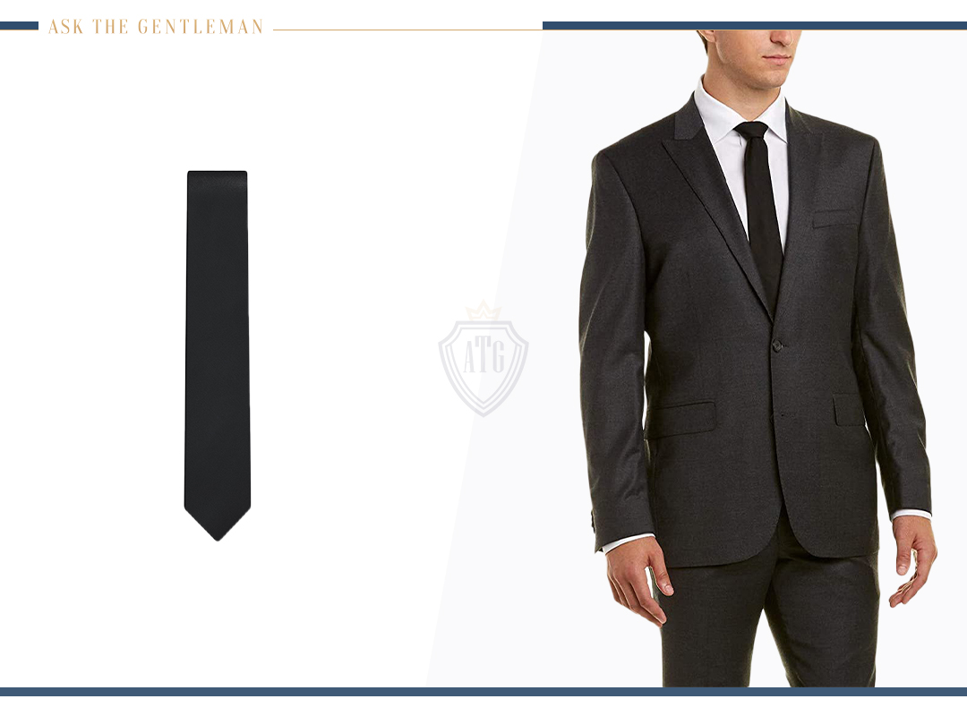 How to wear a charcoal suit with a black tie and white shirt