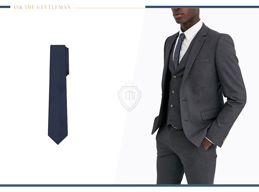 How to wear a charcoal suit with a navy tie and white shirt