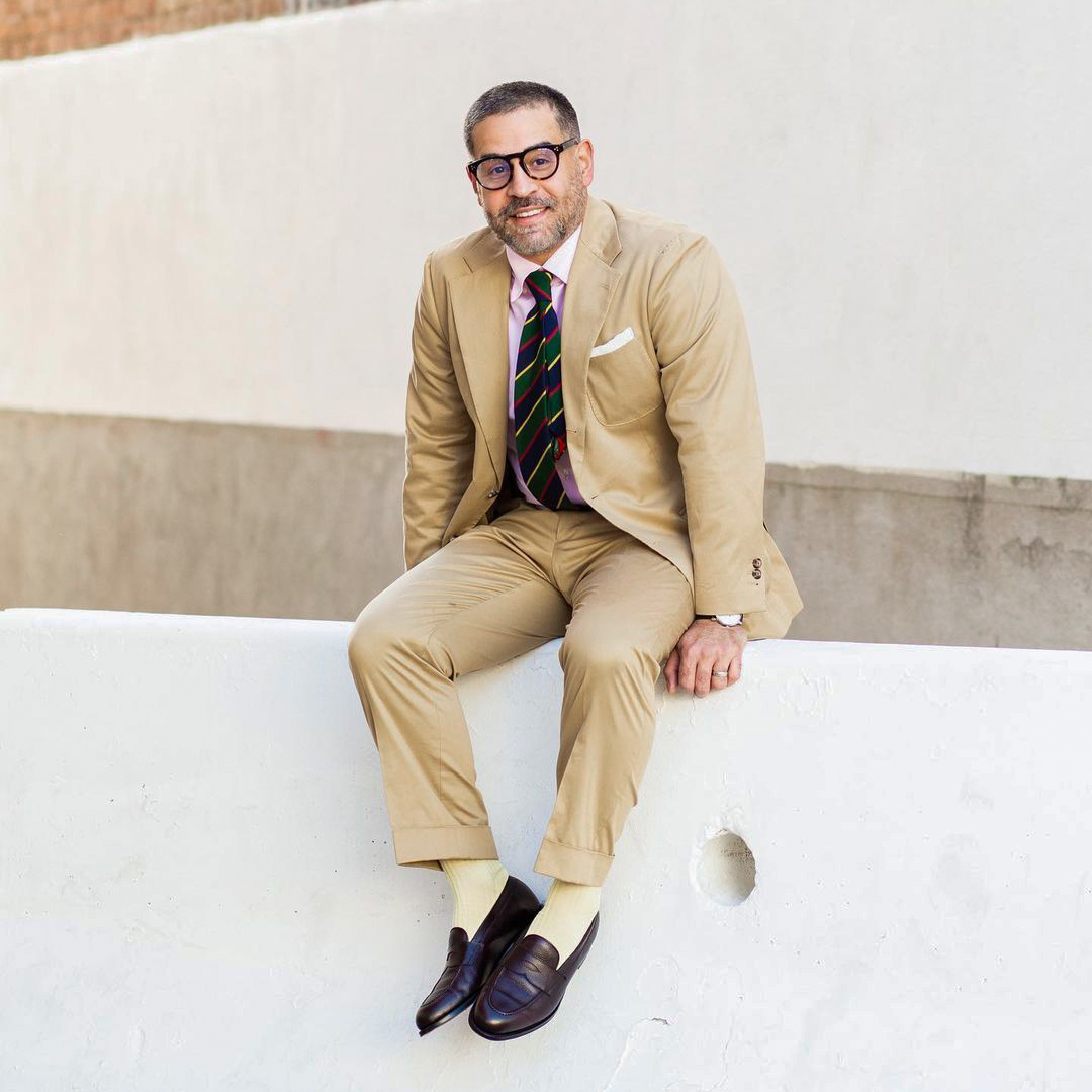 How to wear a tan suit with a light pink dress shirt and striped tie