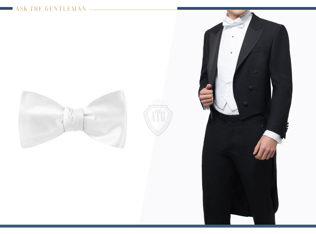 White bow tie with a dinner jacket and tuxedo shirt