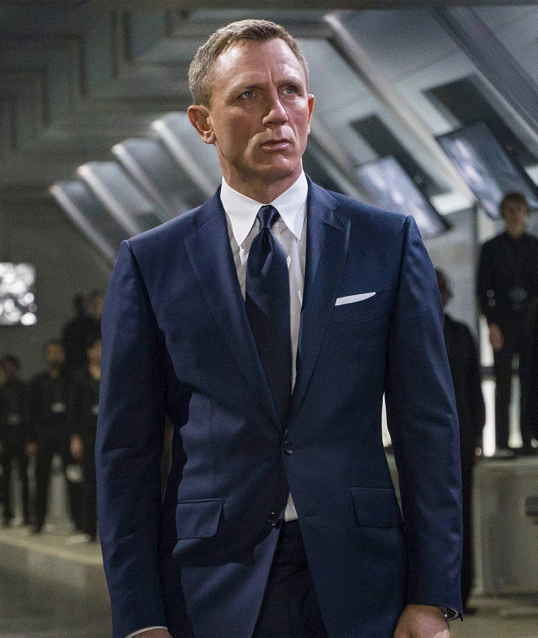 James Bond is wearing a slim-fit navy suit