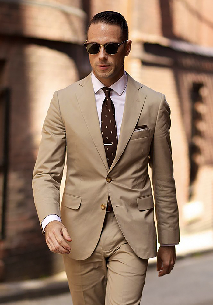khaki cotton suit white dress shirt brown tie