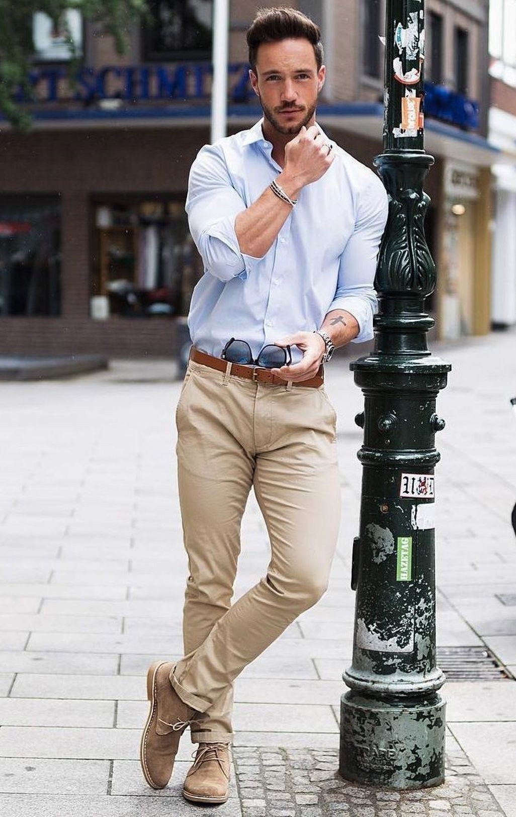 Light blue dress shirt, khaki pants, brown shoes, and brown belt