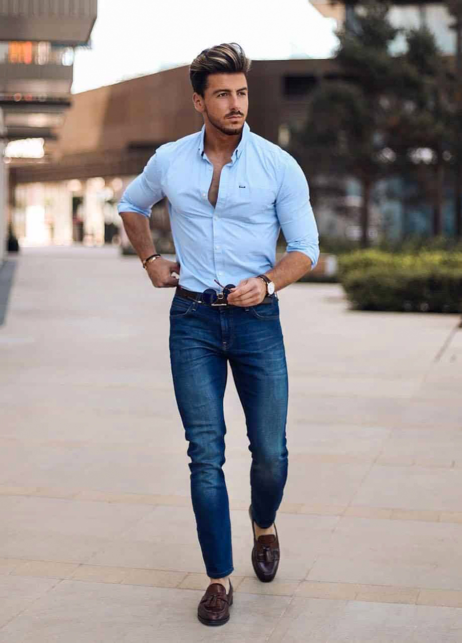 Light blue shirt, blue jeans, and brown loafers