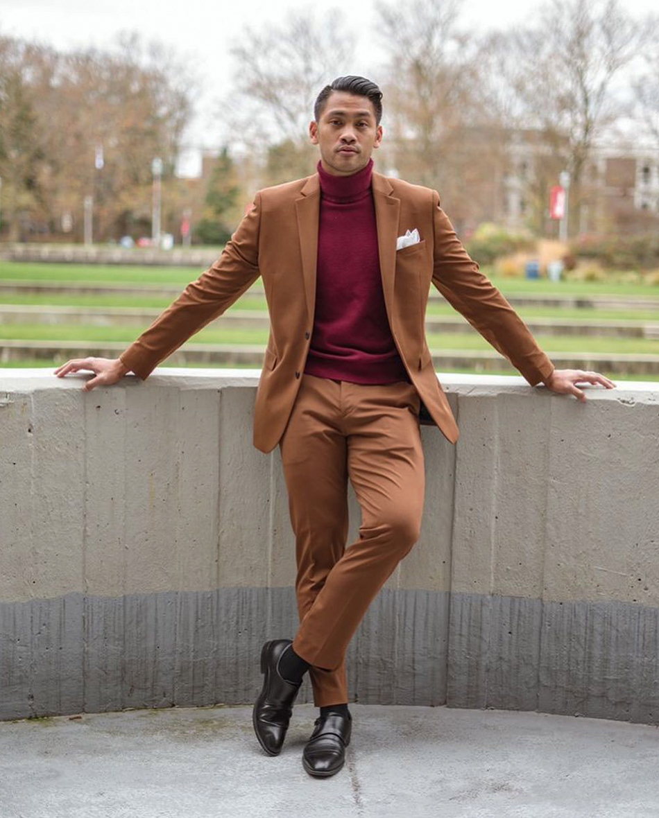 Light brown suit with burgundy turtleneck