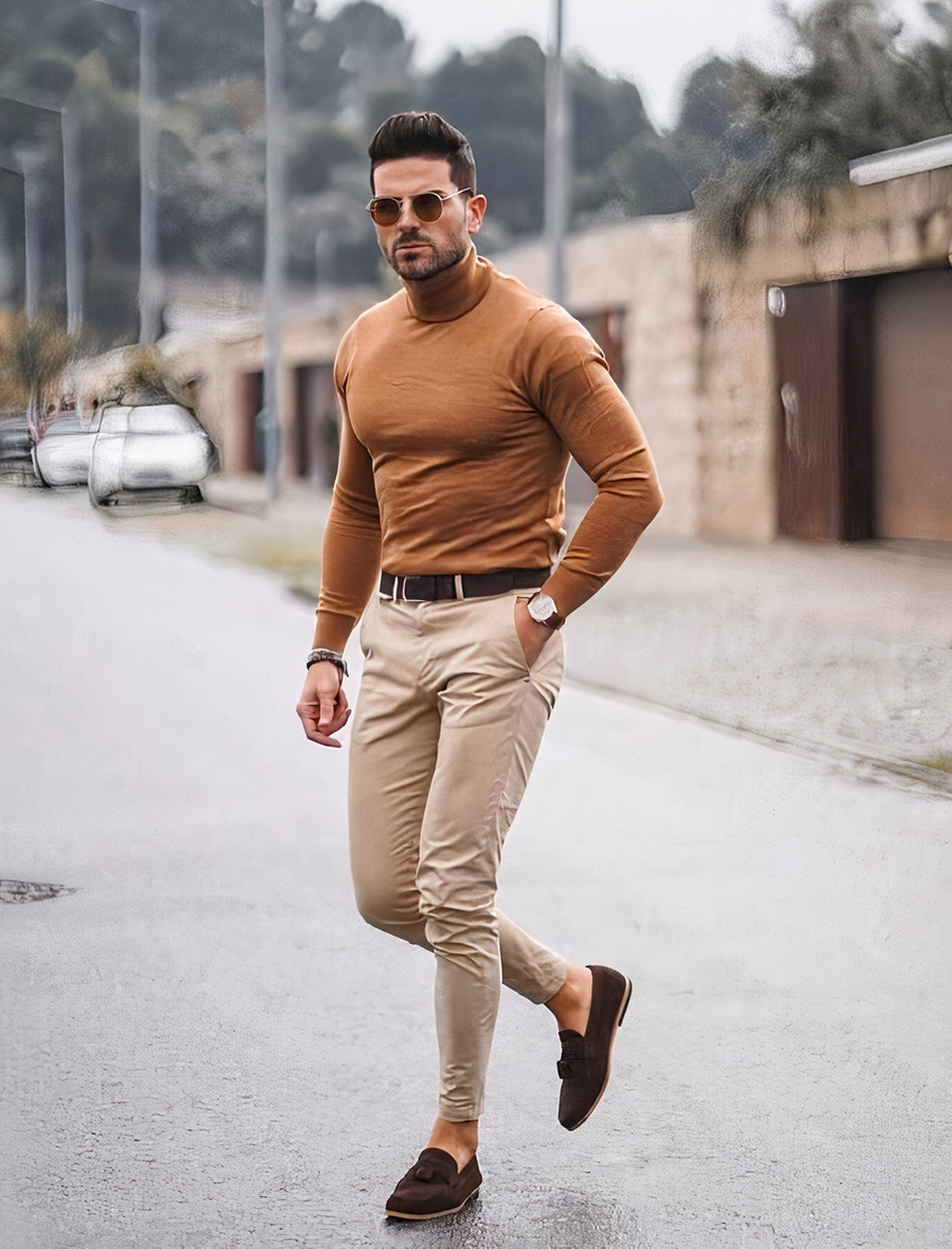 Light brown turtleneck, khaki chinos, and brown loafers