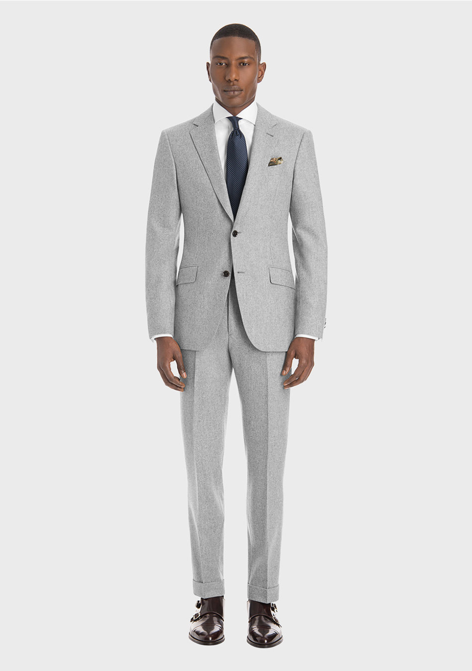 Light grey suit, white dress shirt, and charcoal dotted tie