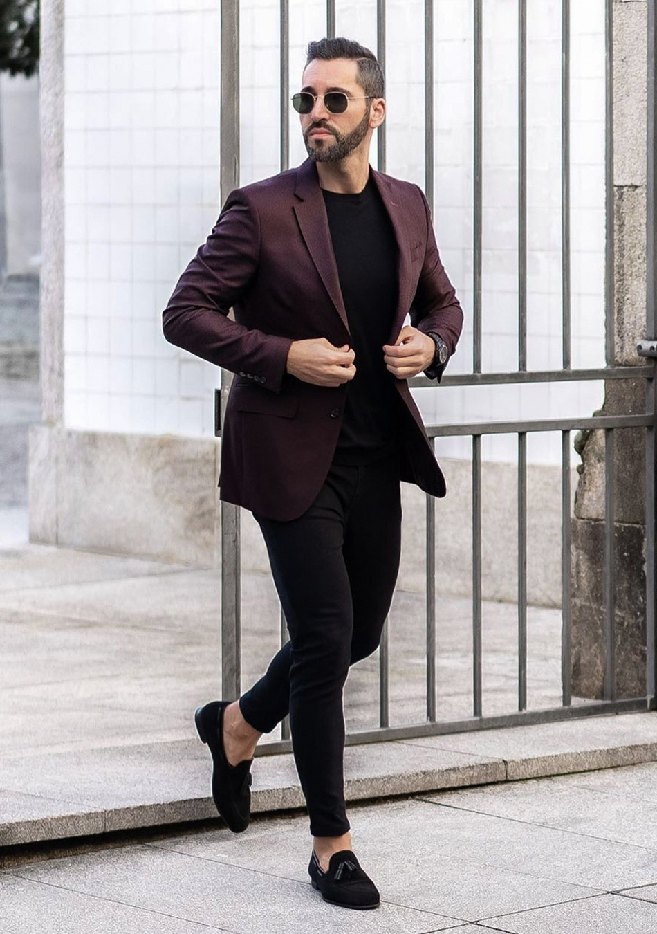 Maroon blazer, black t-shirt, black pants, and black loafers