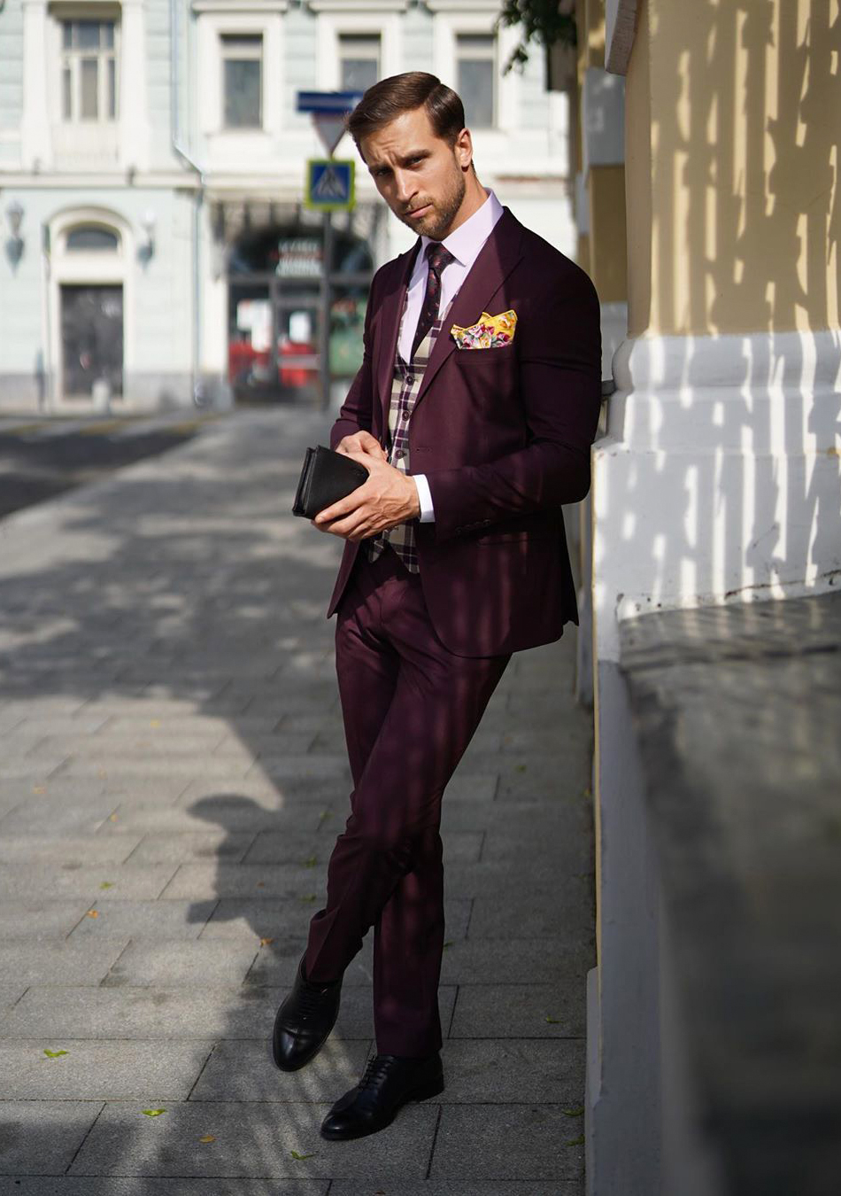 Maroon suit, pink dress shirt, and patterned tie