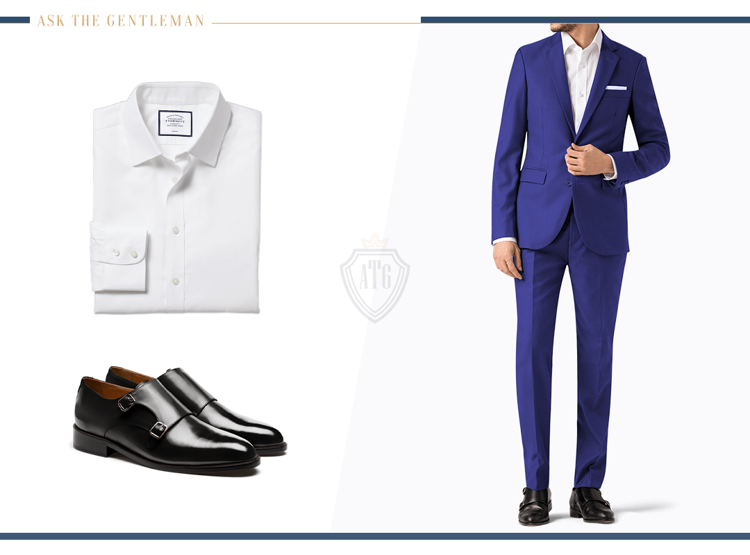Matching a royal blue suit with a white shirt and black monk straps