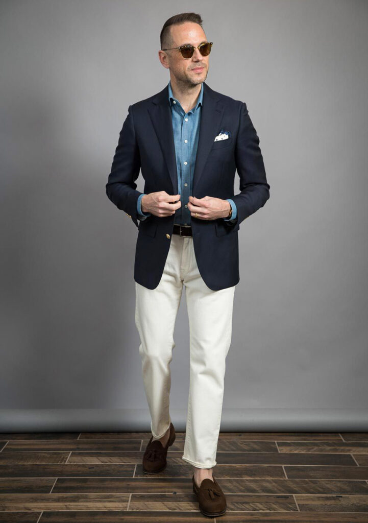 navy blazer denim shirt white pants and brown loafers