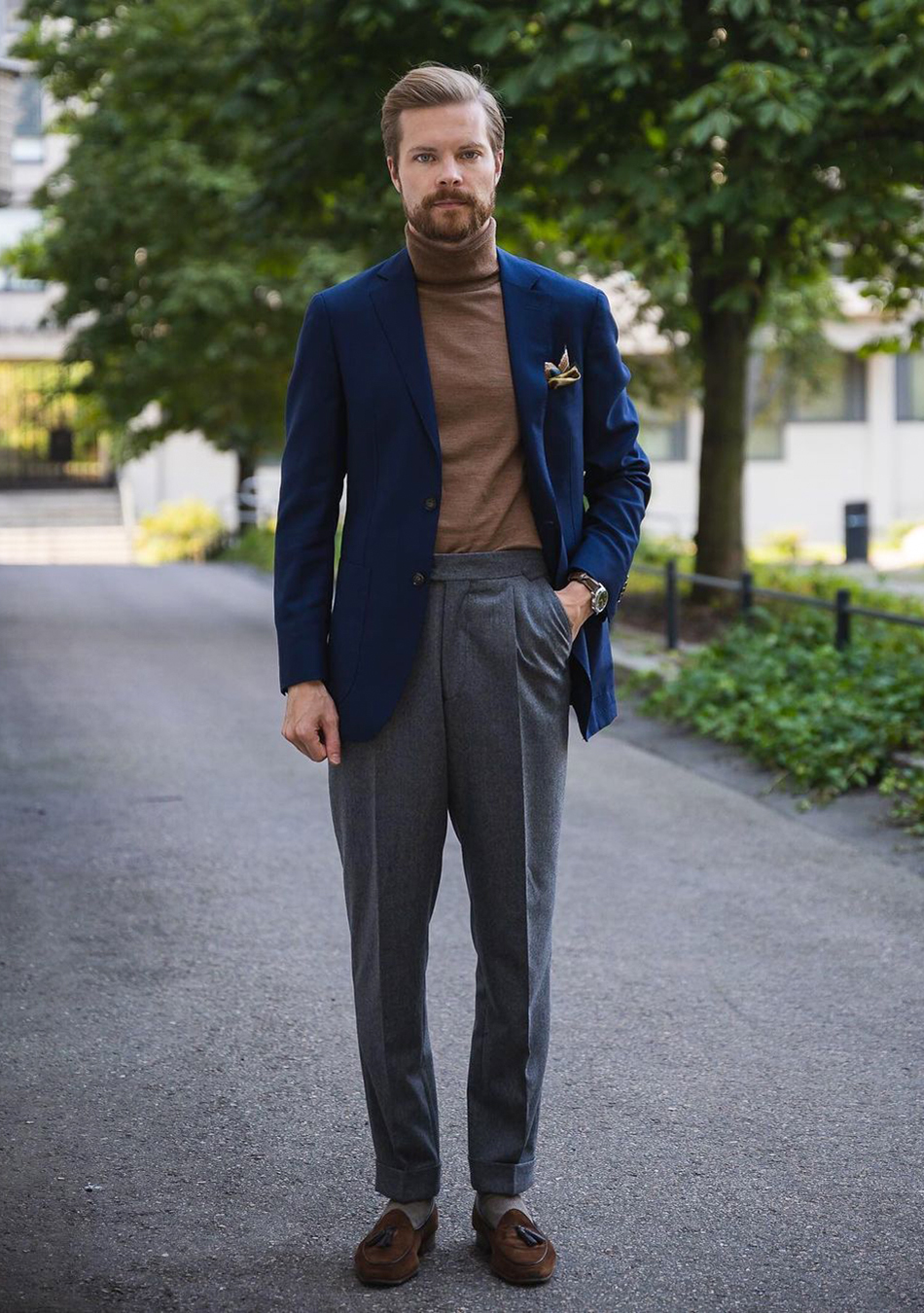 Navy blue blazer, light brown turtleneck, and grey pants