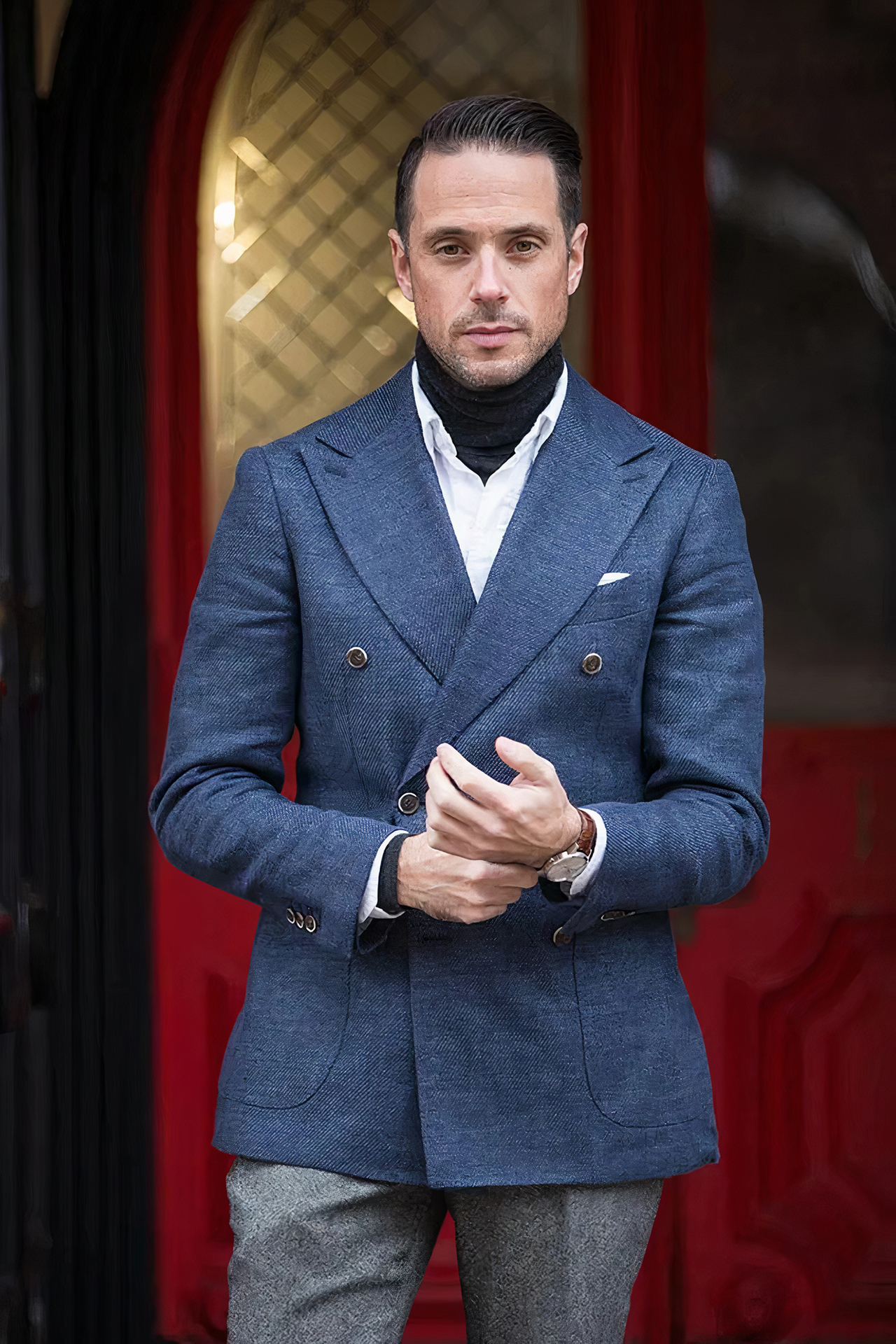 Navy blue double-breasted blazer, white shirt, and black turtleneck