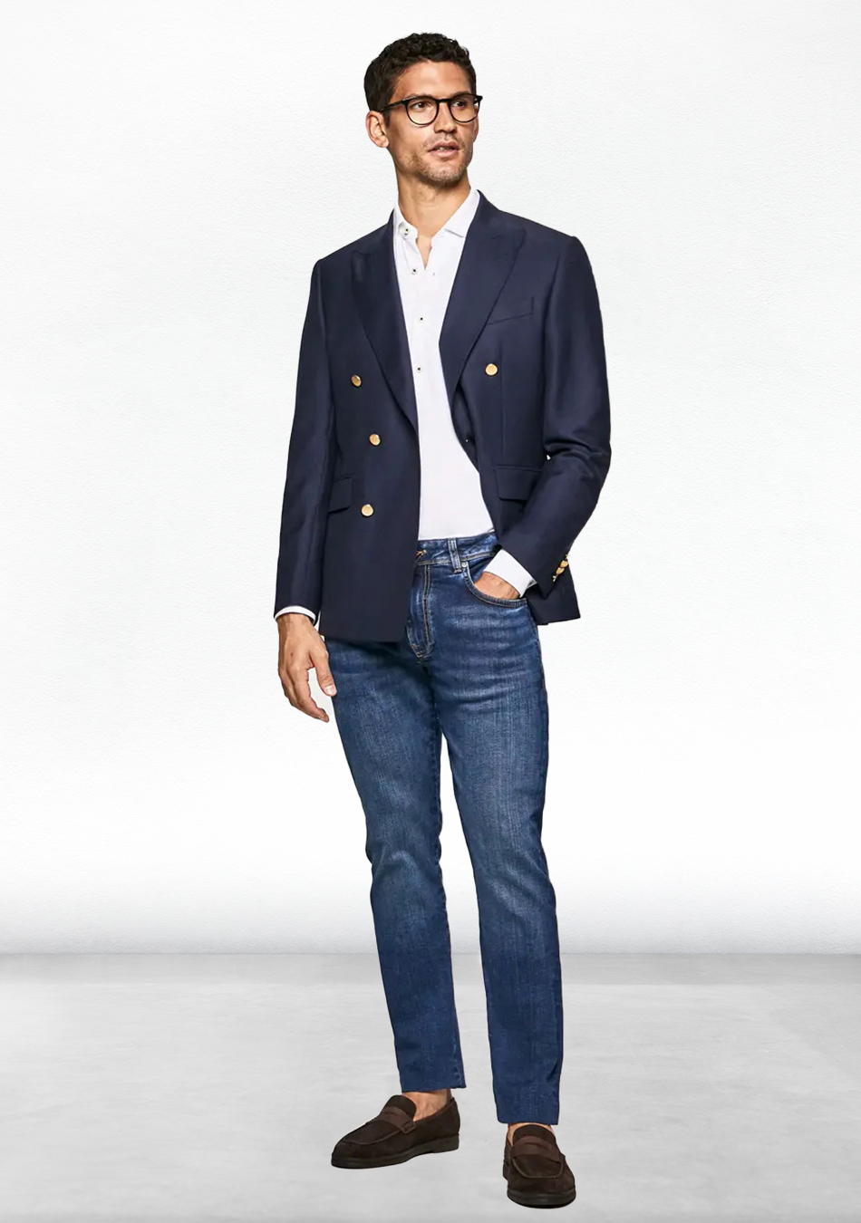Navy double-breasted blazer, white shirt, blue jeans, and brown suede loafers