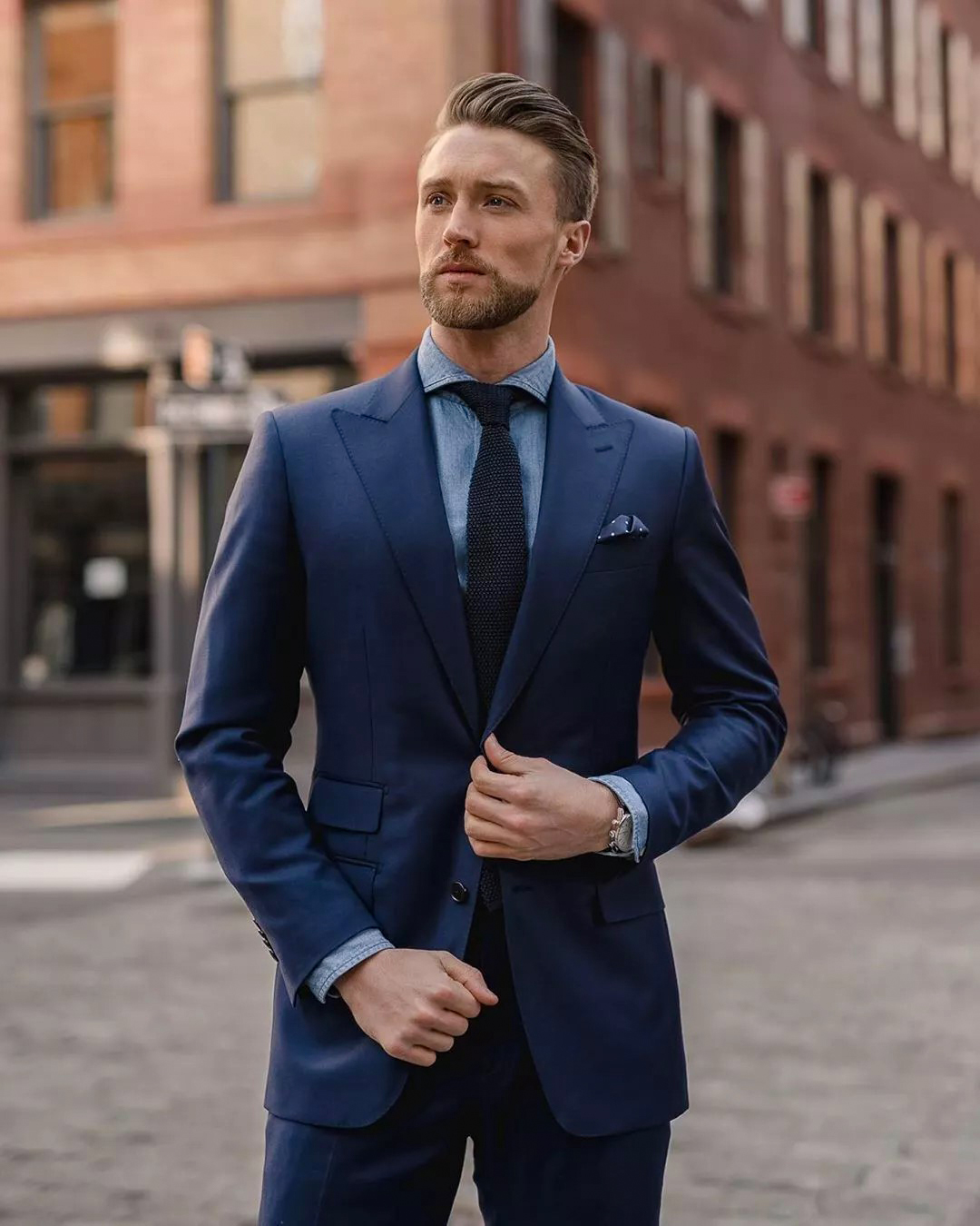 Navy suit with blue denim shirt and dark navy tie