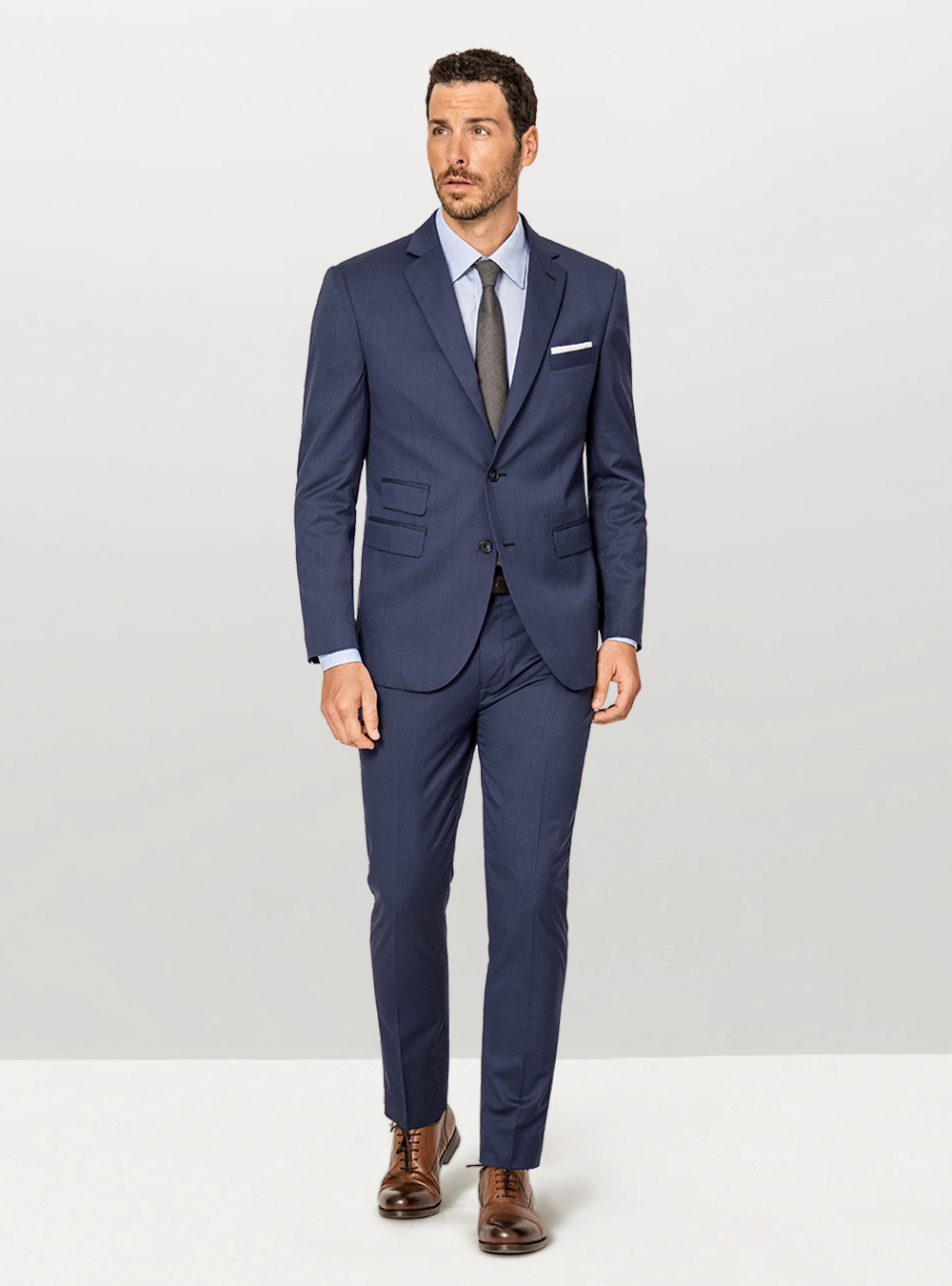 Adding interest to a navy blazer and grey trousers – Permanent Style