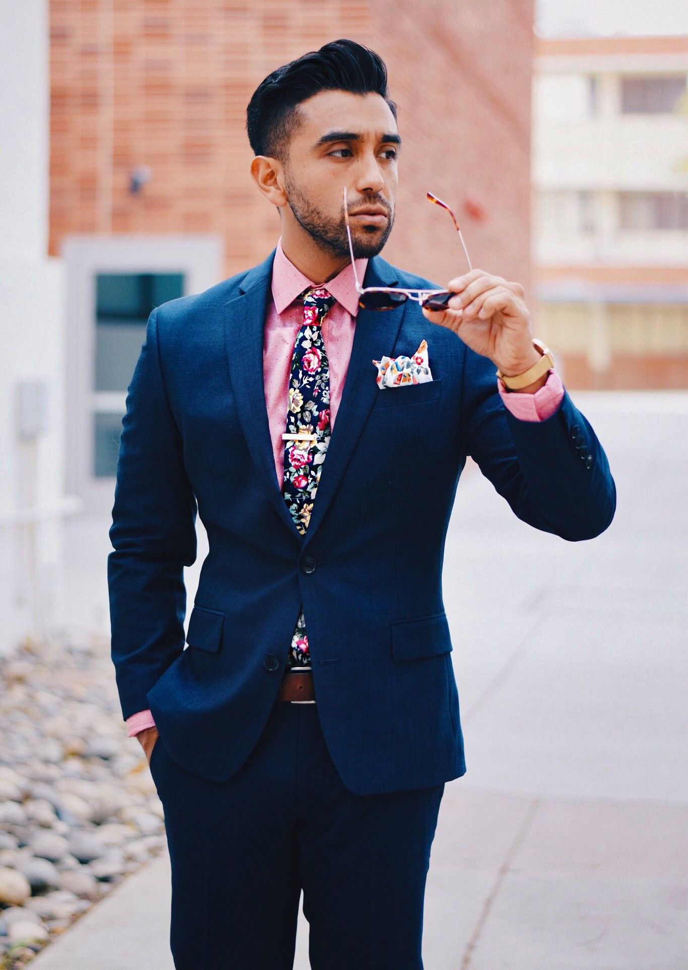 Navy suit, pink shirt, and navy/pink floral tie