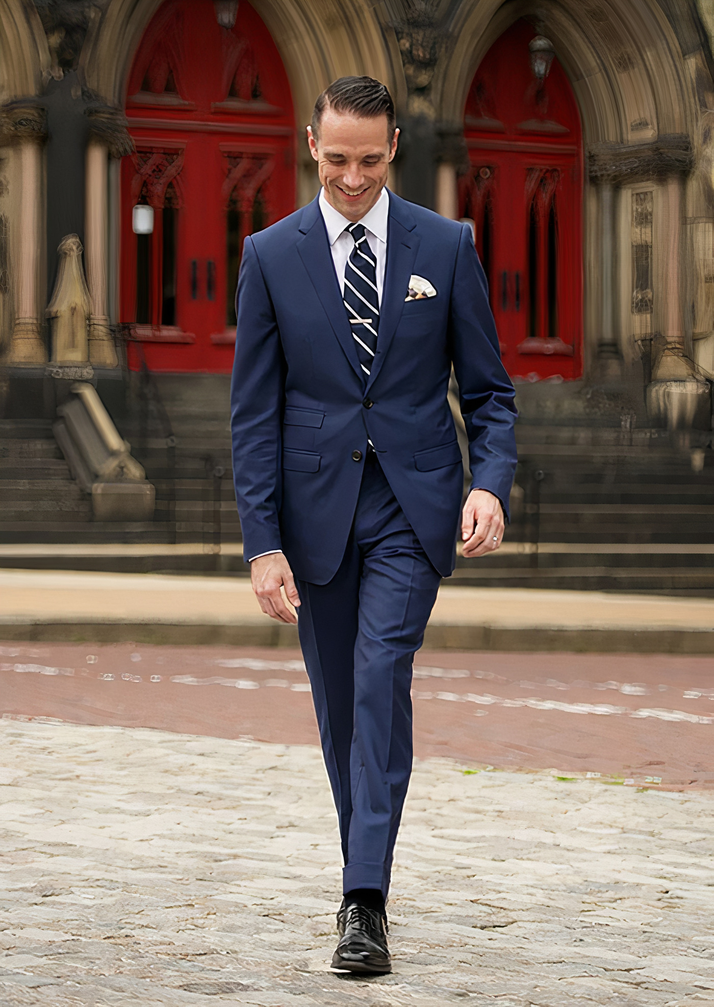 Navy suit, white dress shirt, navy/white striped tie and black oxford shoes