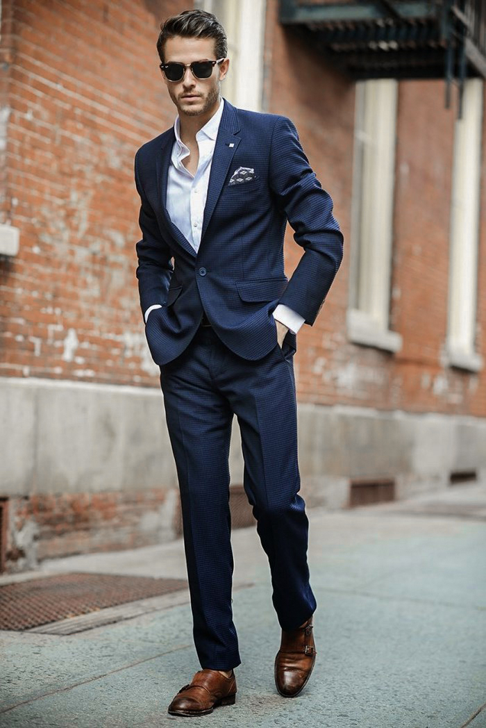 Navy suit, white shirt, and brown monk straps as cocktail attire