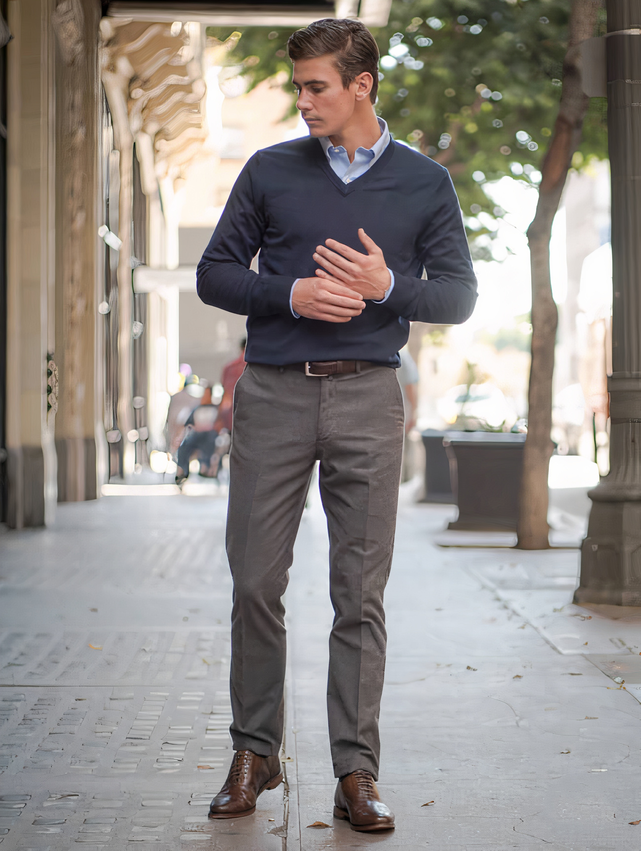 Navy sweater, blue shirt, grey chinos, and brown Oxford shoes