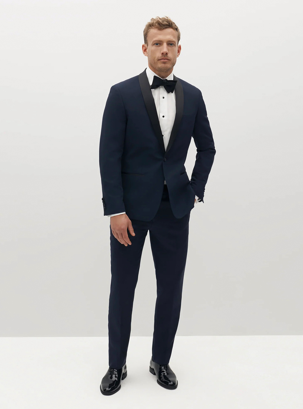 Midnight blue tuxedo, white tuxedo shirt, and black patent Oxford shoes