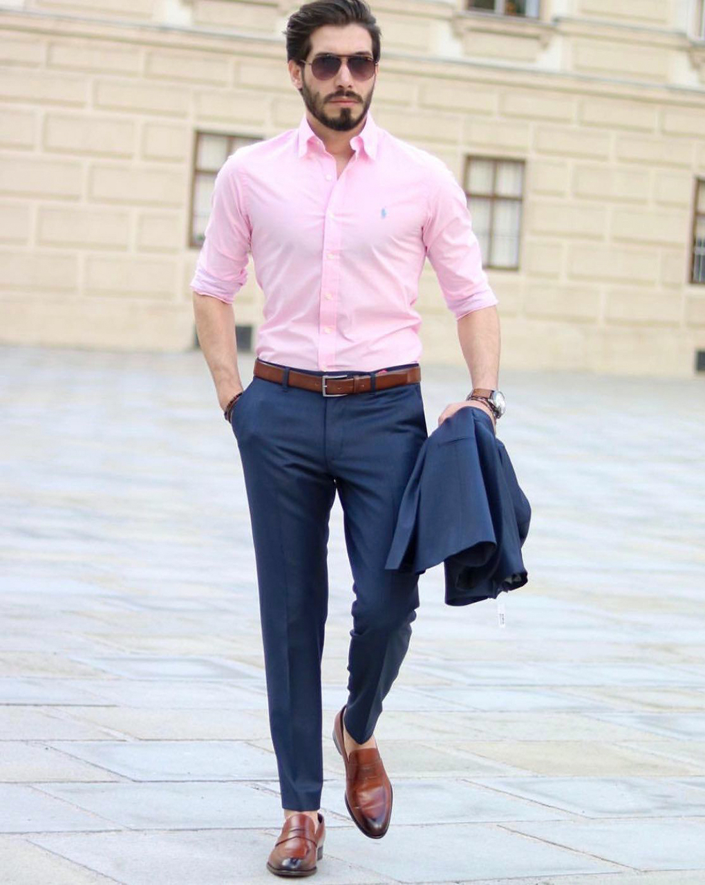 Pink shirt, navy pants and brown loafers