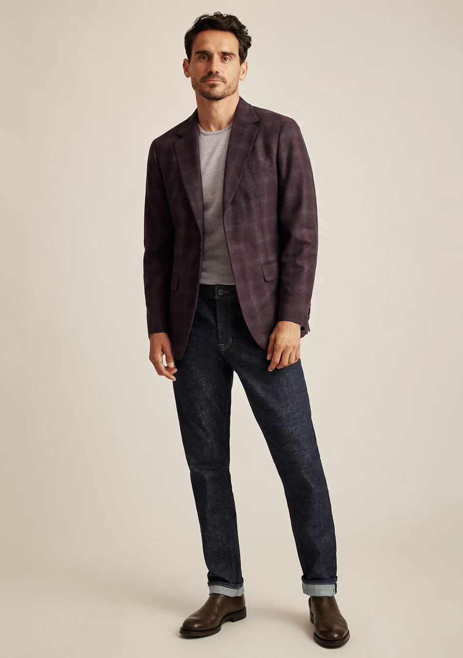 Plum burgundy blazer, grey T-shirt, navy jeans, and brown Chelsea boots