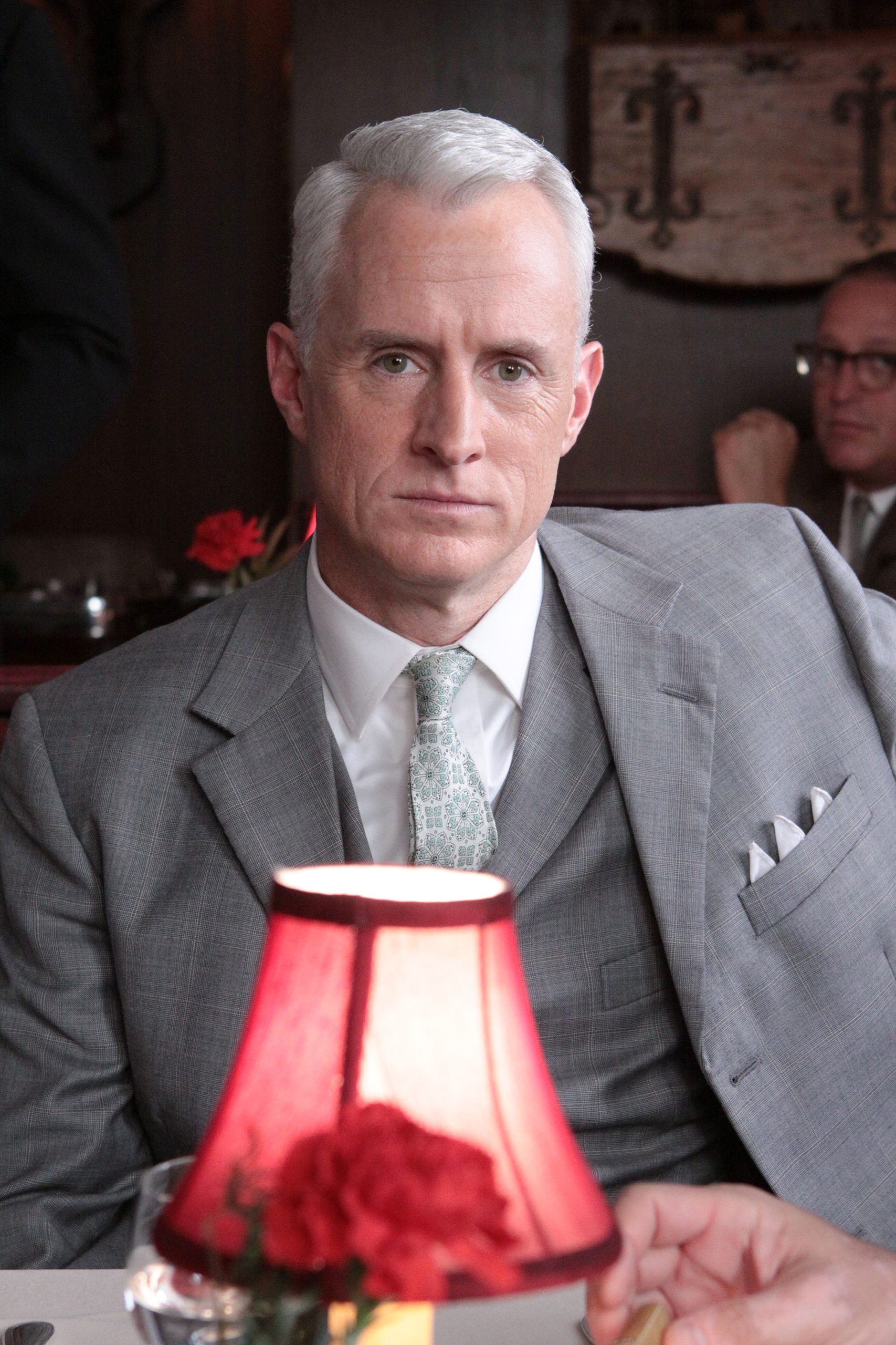 Roger Sterling wearing light-grey suit in Mad Man