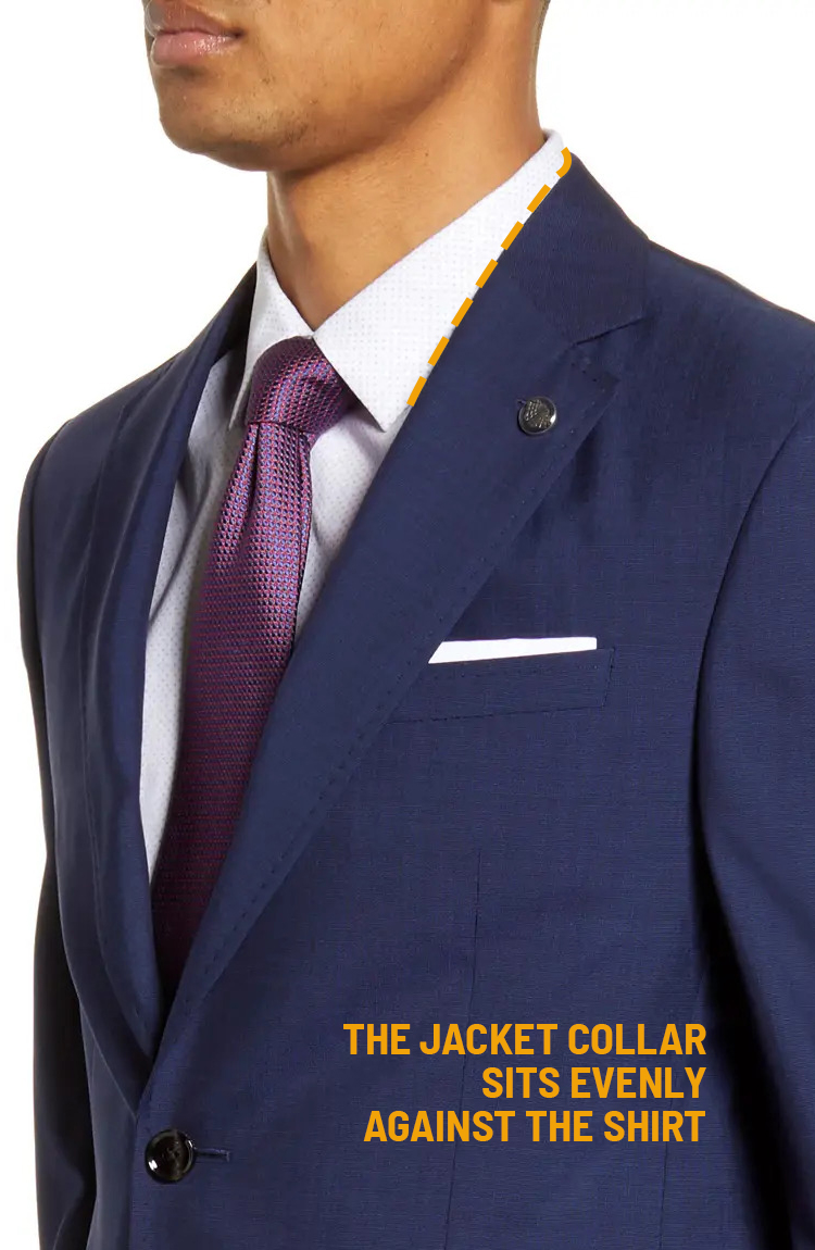 How should a suit fit: the jacket collar sits evenly against the shirt collar